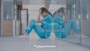 nurse exhausted and struggling with work at the hospital