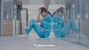 nurse exhausted and struggling with work at the hospital