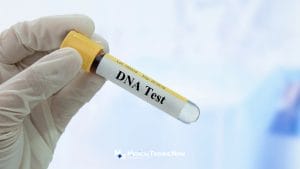 DNA test tube sample from a medical technology laboratory staff