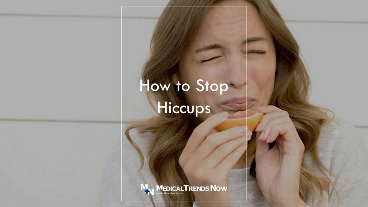 female eating sour fruit to remove hiccups fast