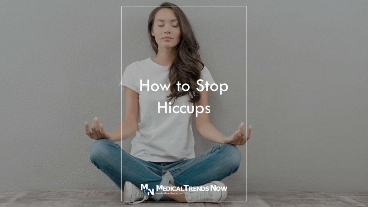 female doing yoga pose to remove hiccups