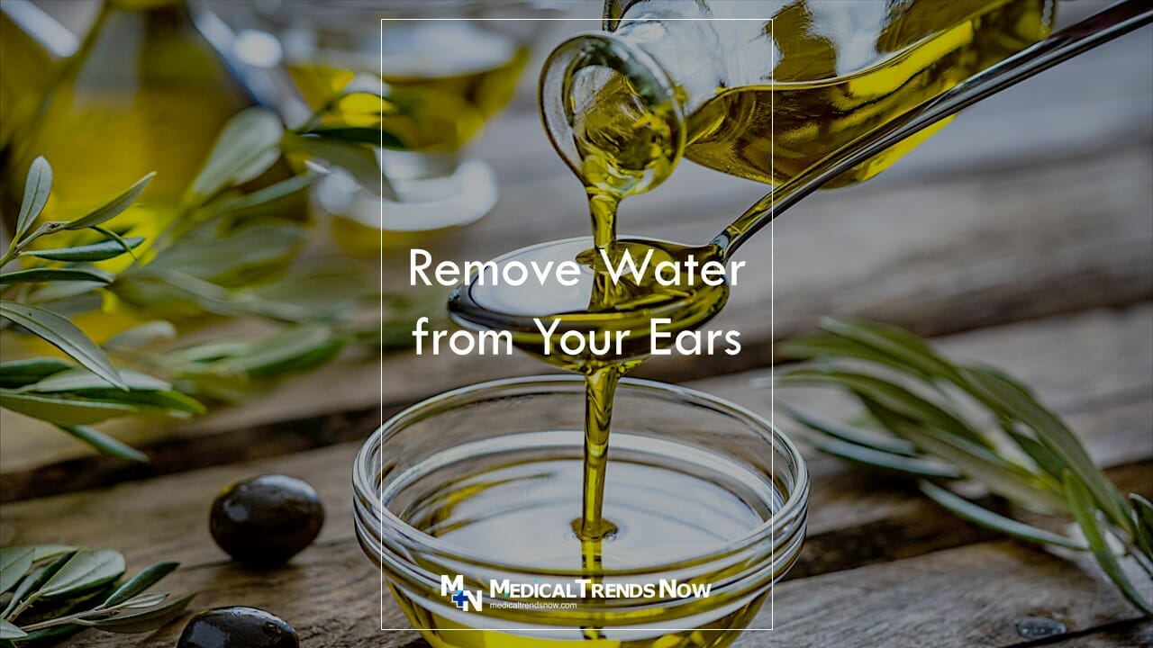 olive oil remove water from ears