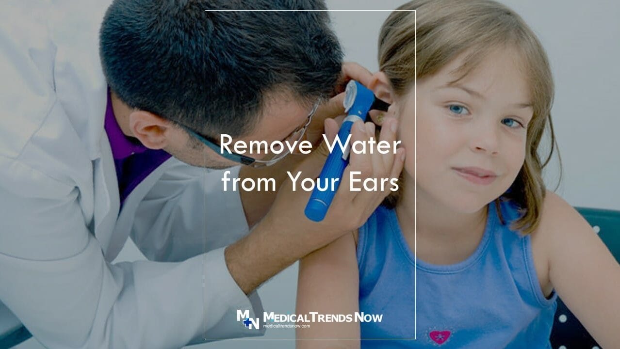 ENT doctor checking ears of a child