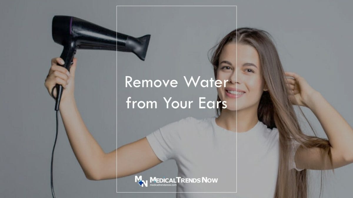 hair dryer to remove water from your ears