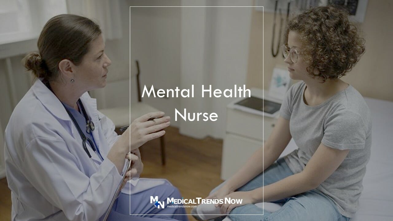 a female nurse talking to a teenage patient