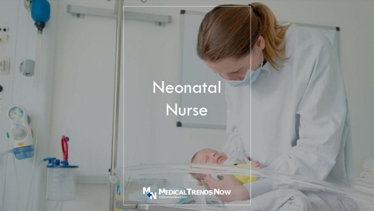 A nurse taking care of an infant