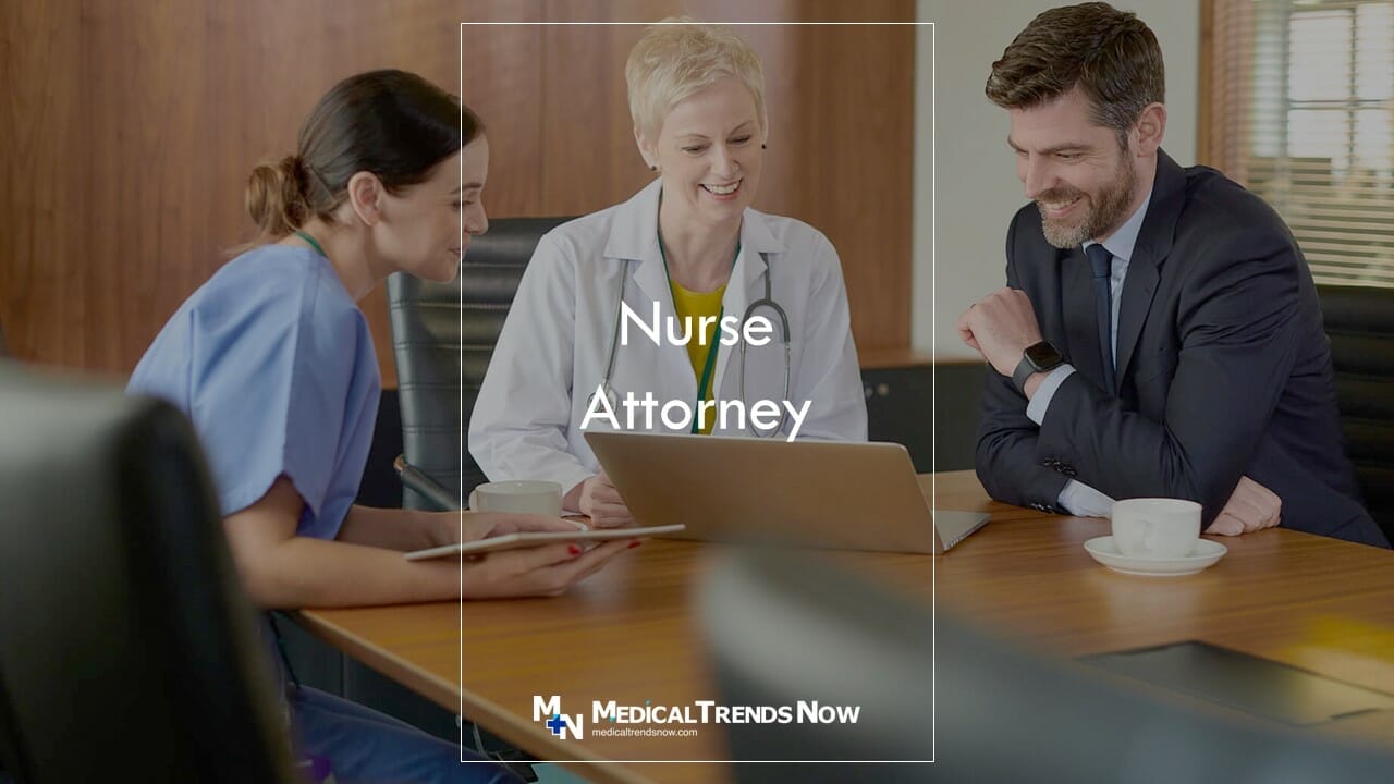 a nurse and doctor talking to a lawyer in a conference room