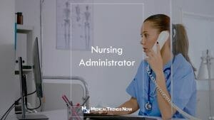 a nurse on a telephone call doing her admin duties