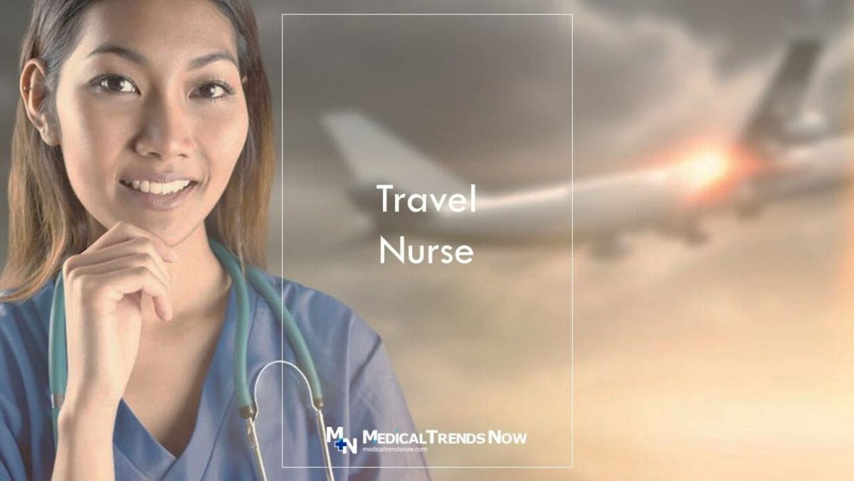A close up shot of an Asian Nurse smiling while an airplane passes by at the background