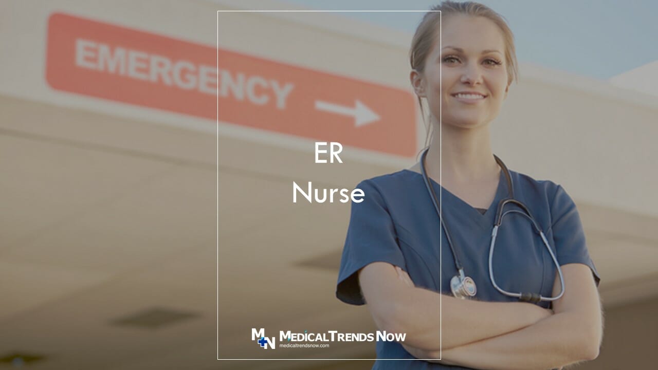 a nurse standing outside the hospital with emergency sign at the background