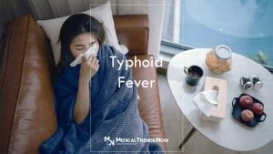 Filipino woman lying in sofa to rest from flu and fever